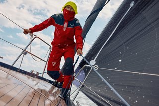 Action shot British sailor Will Harris on foredeck, hood up, wearing BR3 Offshore Jacket & Trousers_82547_169_L_36