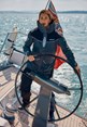 Action shot of British sailor Pamela Lee wearing BR3 Offshore Jacket &amp; Trousers on helm_82548_964_L_9